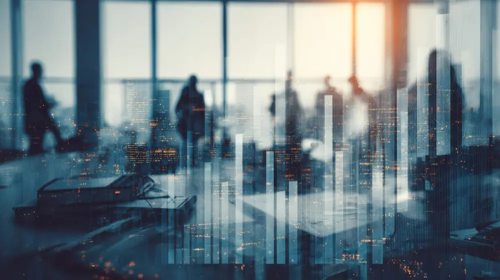 Two silhouetted figures in conversation before a city skyline